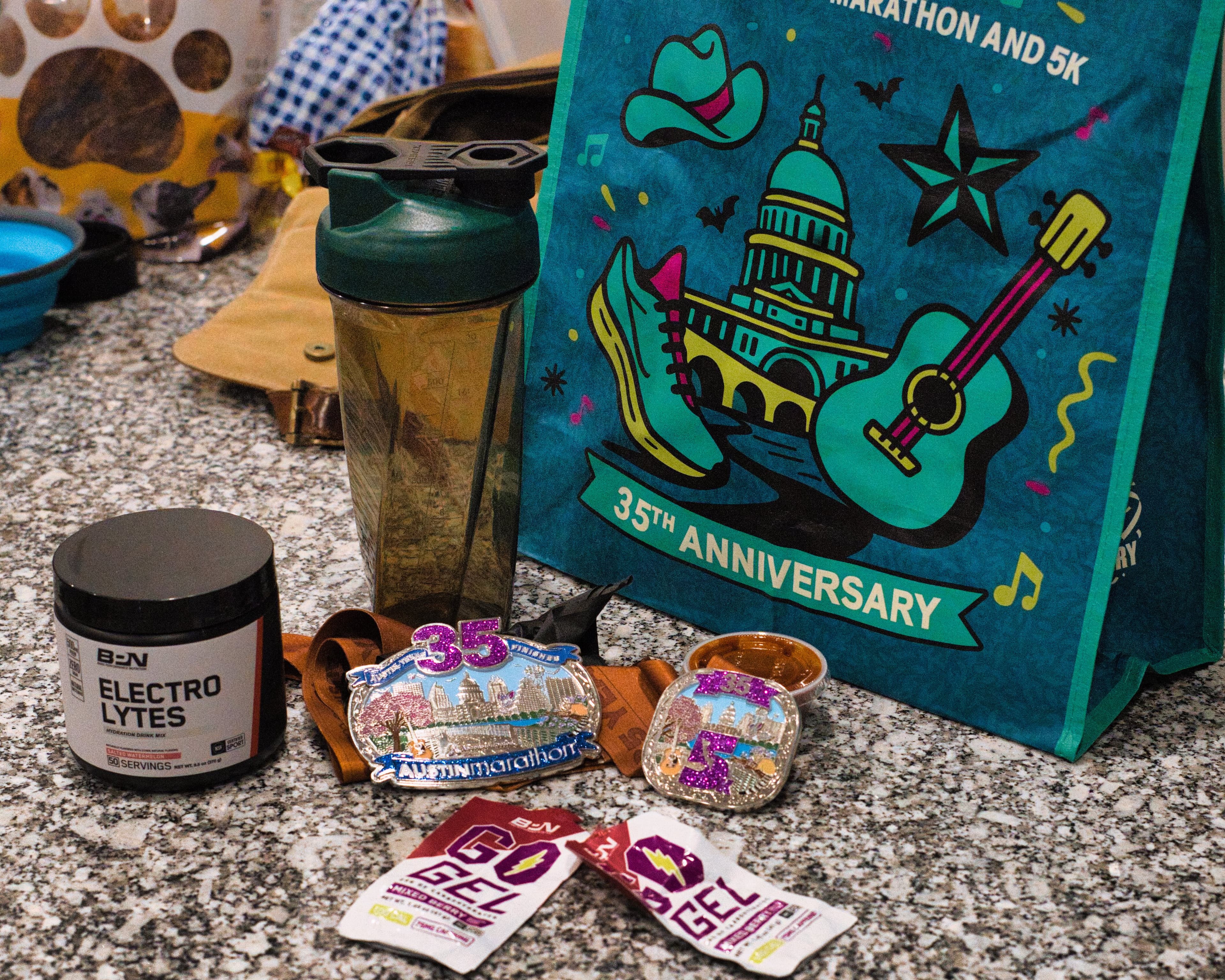 Austin Marathon medals displayed on counter