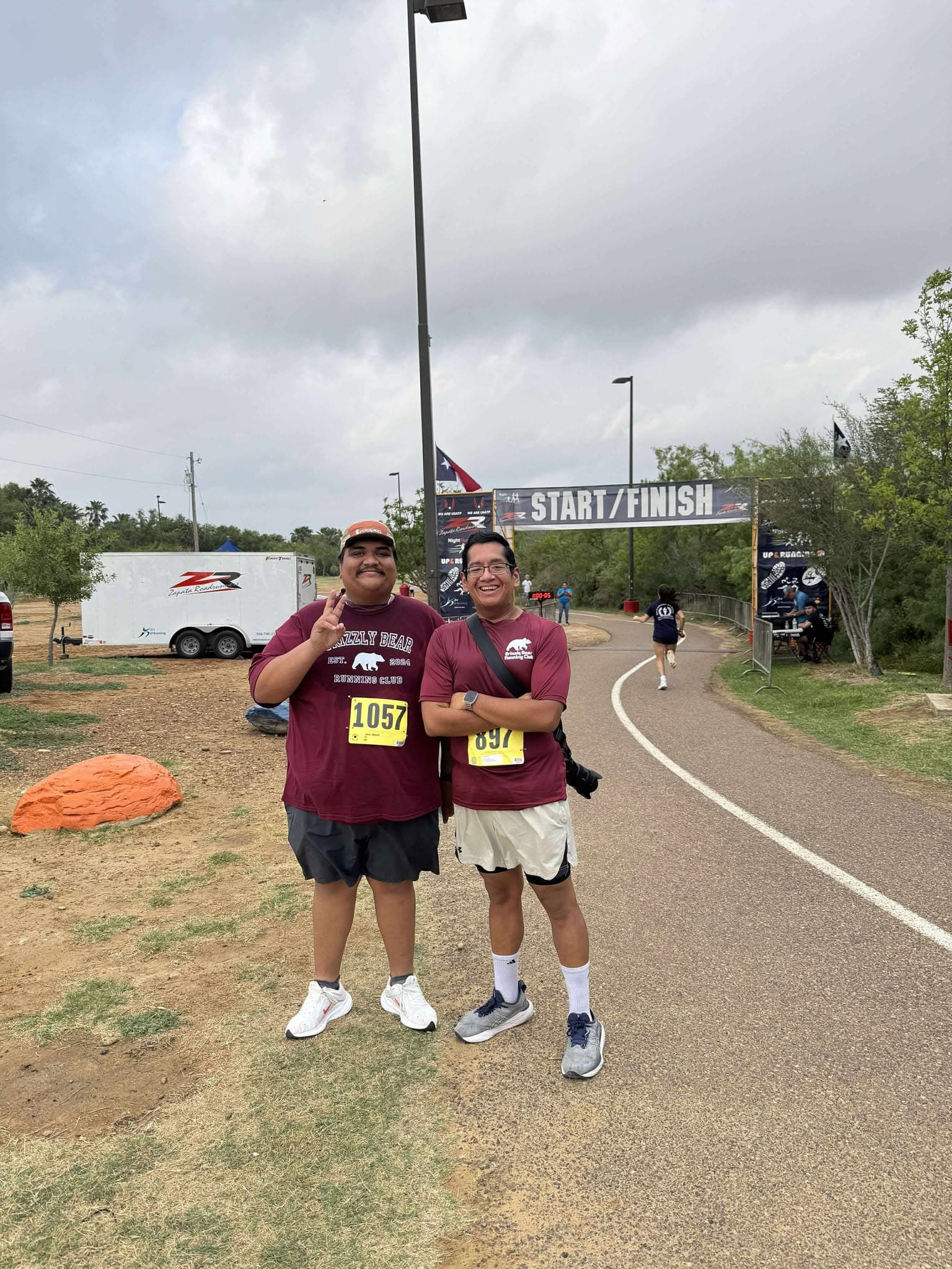Runner celebrating at finish line