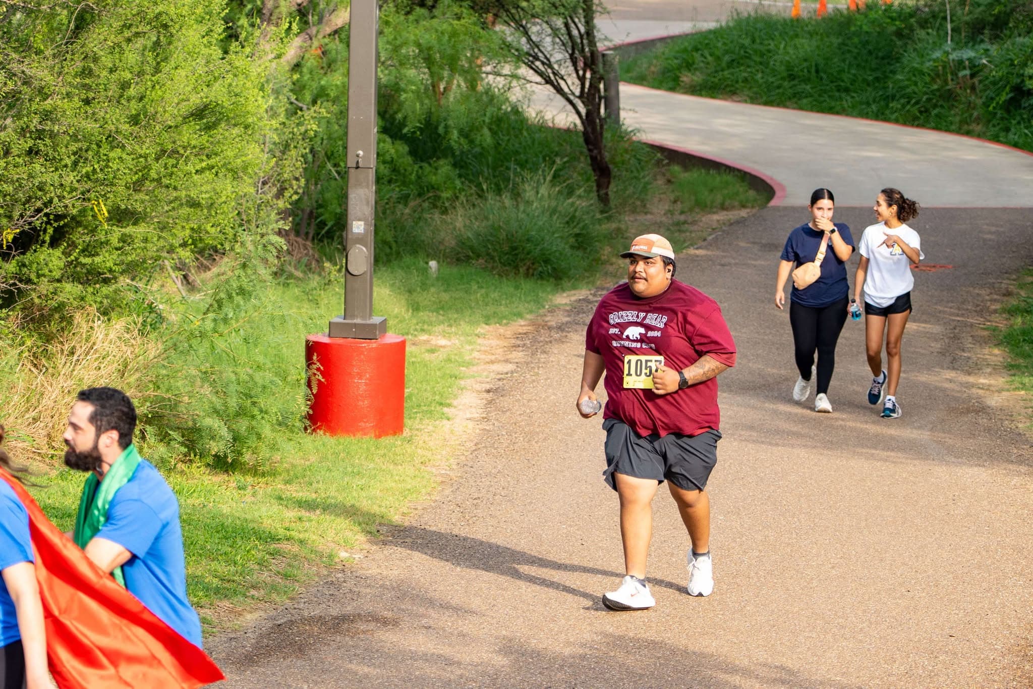 Group of runners passing a checkpoint